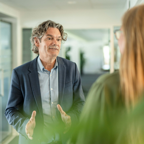 Leader talking to employee